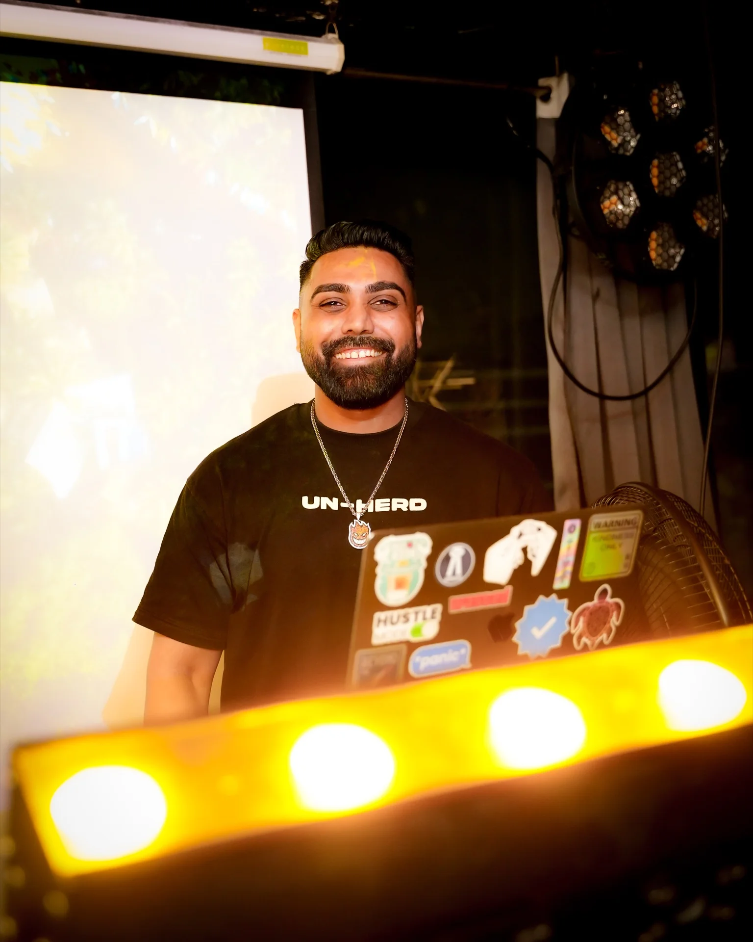 Jonas Monteiro at the DJ setup at House Party